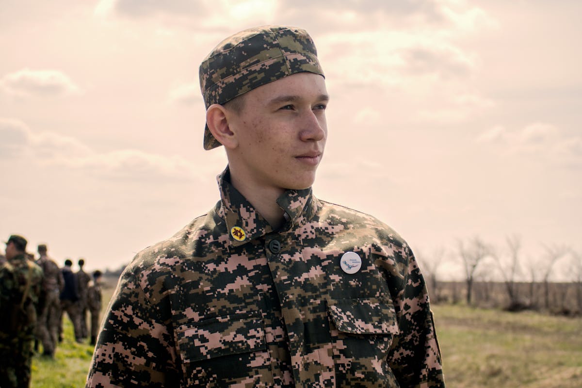 With his unit during deployment